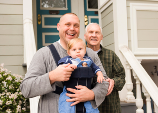 Grandfather, son and grandson spending time together