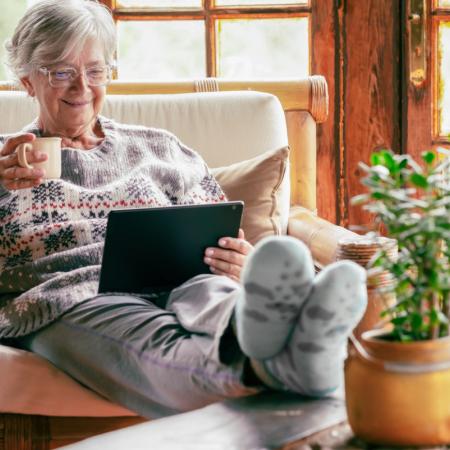 Healthy senior sitting inside during the winter